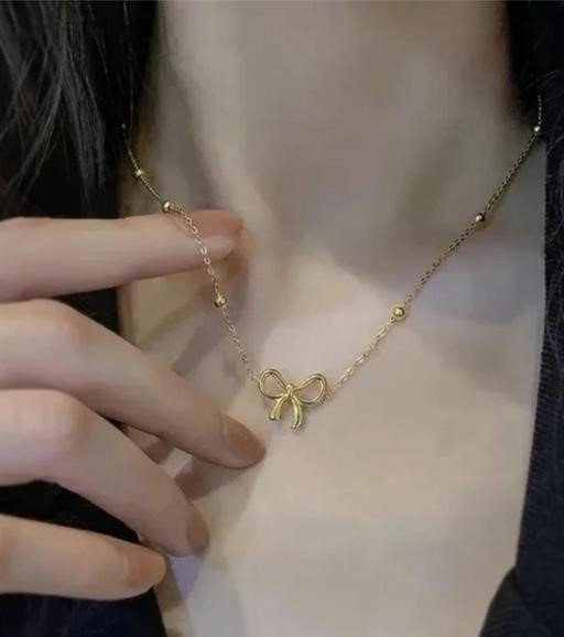 Golden Bow Charm Earrings & Necklace Set